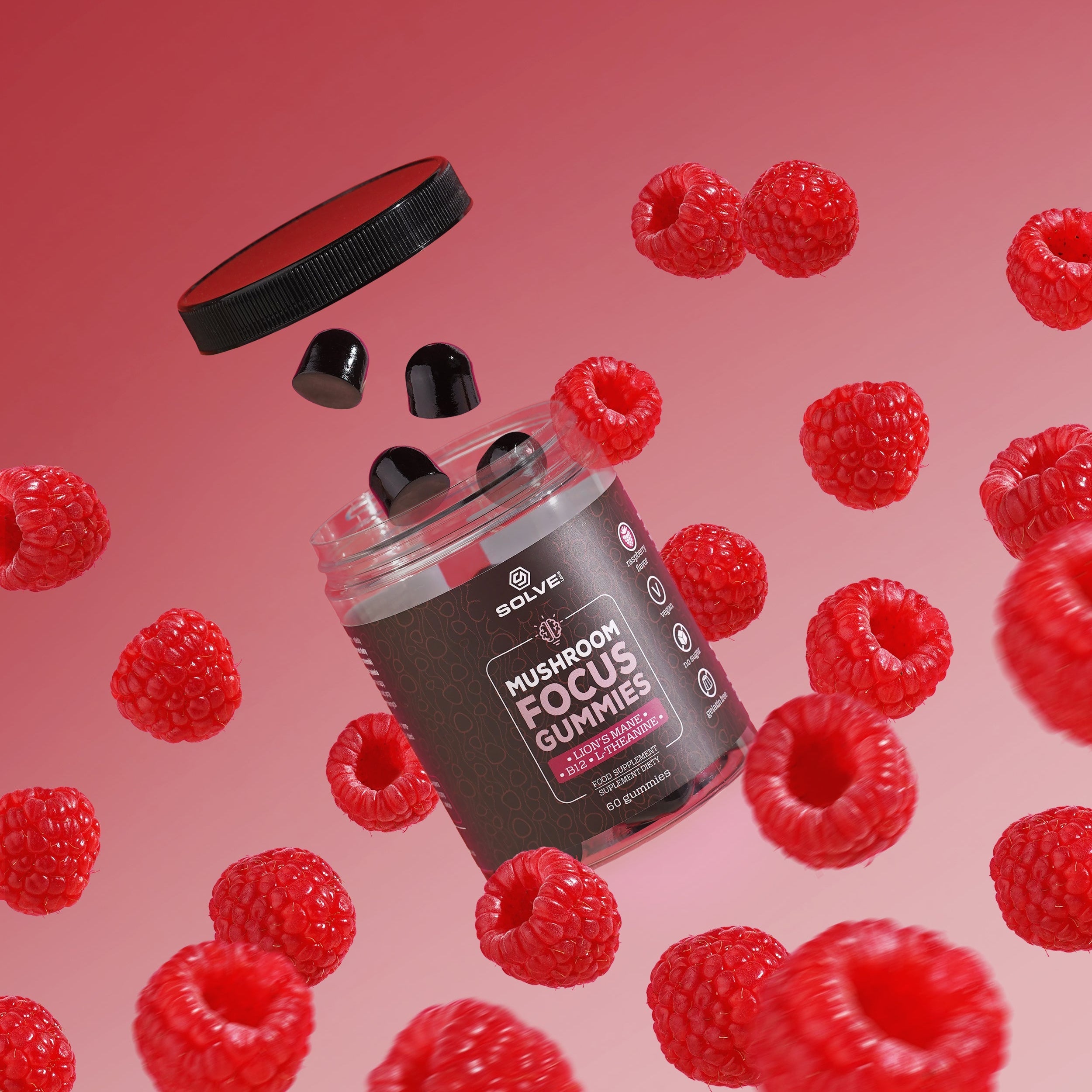 Supplement container labeled 'Nushroom Focus Gummies' surrounded by raspberries on a red background